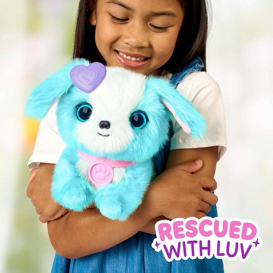 A girl hugging her rescued blue ScruffaLuvs puppy